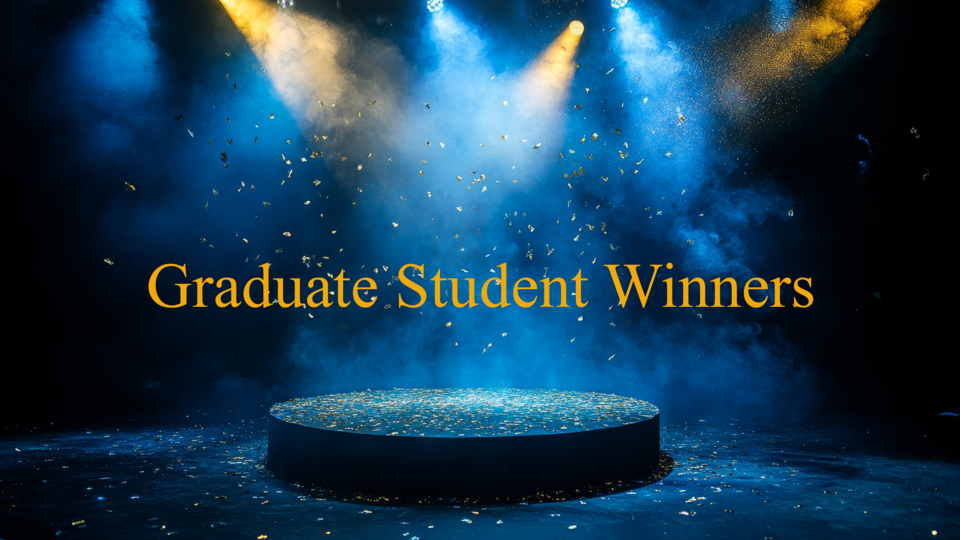 A spotlight-lit stage with blue and gold lighting and falling confetti, displaying the words ‘Graduate Student Winners’ in large gold lettering.