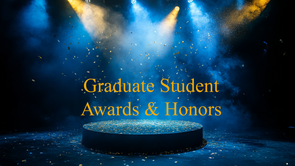 Stage with dramatic blue and gold lighting and falling confetti, featuring the text ‘Graduate Student Awards & Honors'