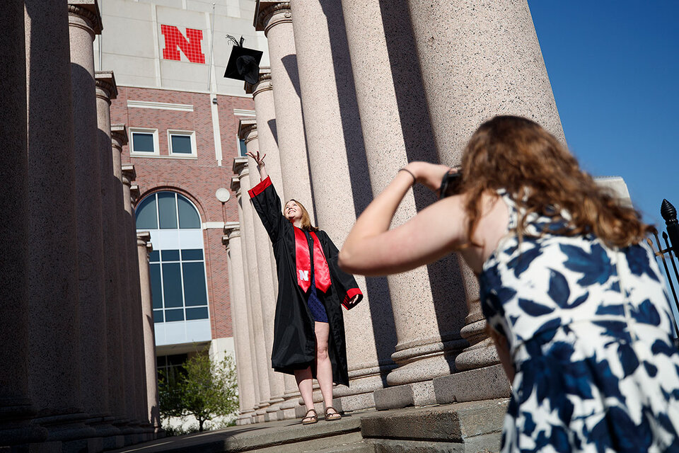 Graduate in cap and gown